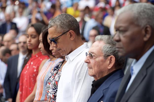 https://upload.wikimedia.org/wikipedia/commons/0/0b/President_Obama,_the_First_Lady,_and_Cuban_President_Castro_Observe_Moment_of_Silence_in_Respect_to_Victims_of_Terrorist_Attack_on_Brussels_%2825903928701%29.jpg